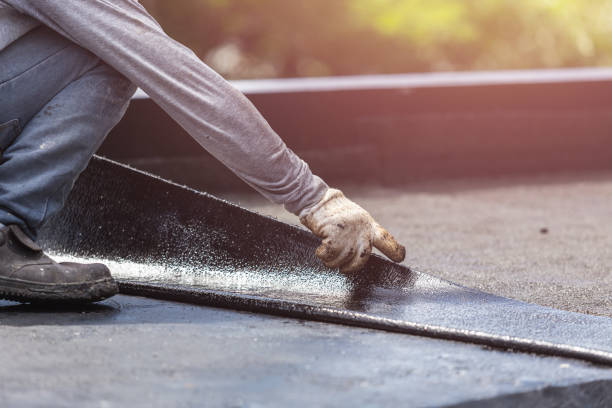 Professional Waterproofing technician working in Merrill, MI